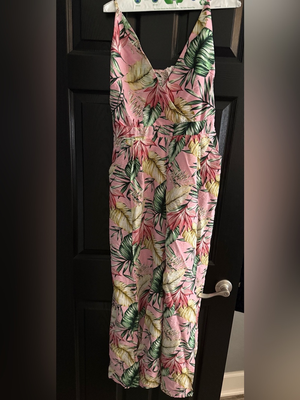 Woman’s Pink Tropical Print One-Piece Romper.